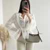 Blusa pizzo e manica a campana bianca