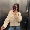 Camicia con ricami rosa