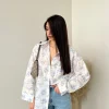 Camicia in cotone fiori lilla